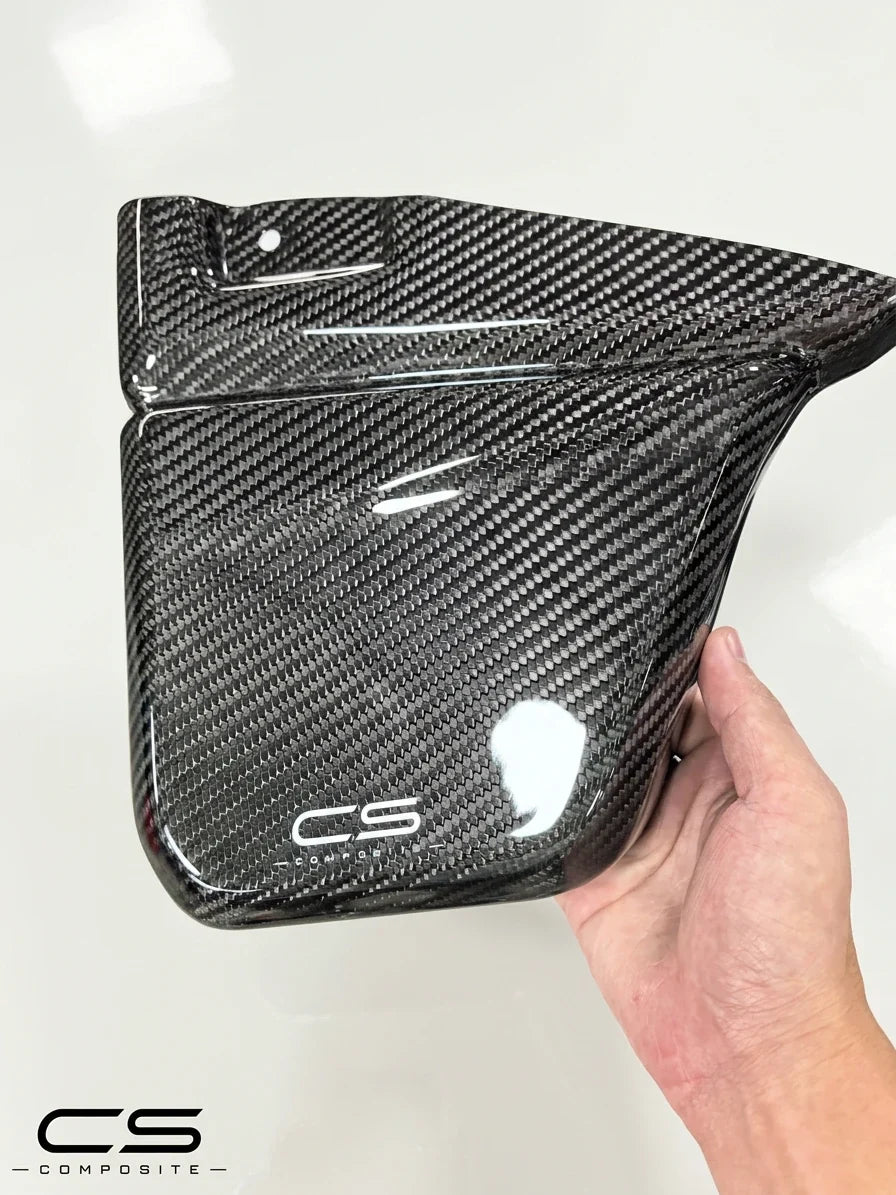CS Composite dry carbon fibre panel held in hand, showing the 3K weave finish